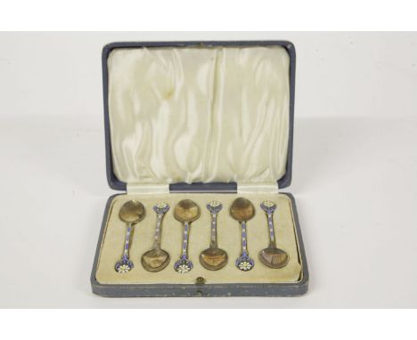 A set of George VI silver and enamel teaspoons, Birmingham 1937, cast and enamelled with flowerheads