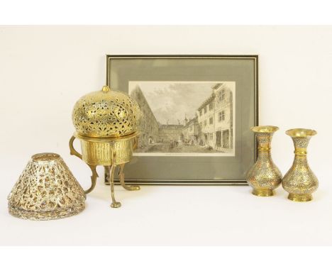 A pierced brass pomander, on tripod base, a pair of brass vases, a set of four pierced white metal shades, and an architectur