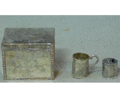 A white metal plated trinket box with Art Nouveau style floral design with rope twist design corners, a white metal Oriental 