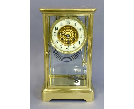 A Brass Four Glass Striking Mantel Clock, circa 1900, the twin barrel movement striking on a gong, twin tube mercury pendulum
