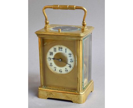 A Brass Striking and Repeating Carriage Clock, circa 1900, the twin-barrel movement striking on a gong, 18cm highMovement is 