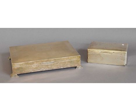 An Elizabeth II Silver Cigarette-Box, by Charles S. Green and Co. Ltd., Birmingham, 1970, oblong and on four stepped feet, th
