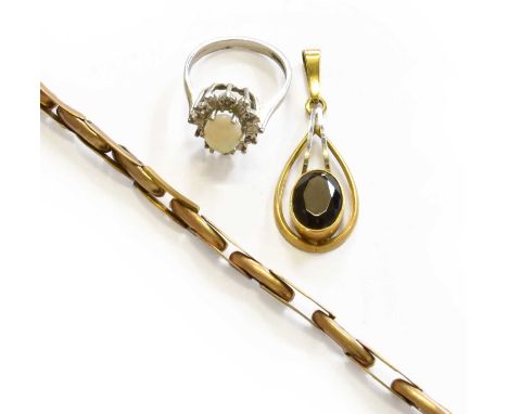 An Expanding Watch Bracelet, stamped ‘9CT’; A Smoky Quartz Pendant, stamped ‘9’ and ‘.375’, length 4.1cm; and A 9 Carat White