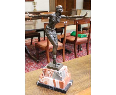 After Dimitri: an Art Deco style bronze and marble figure, 50cm