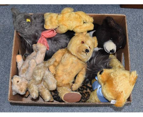 20th Century Teddy Bears and Soft Toys, comprising: a Steiff modern brown bear, a yellow plush Steiff bear, a large grey cat 