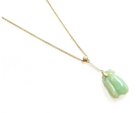 A Jade and Split Pearl Necklace, stamped '9CT', drop length 4.3cm, necklace length 39.5cmThe necklace is in good condition wi