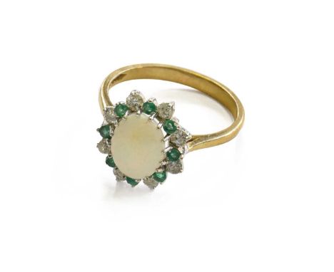 A 9 Carat Gold Opal, Diamond and Emerald Cluster Ring, finger size RGross weight 3.0 grams.