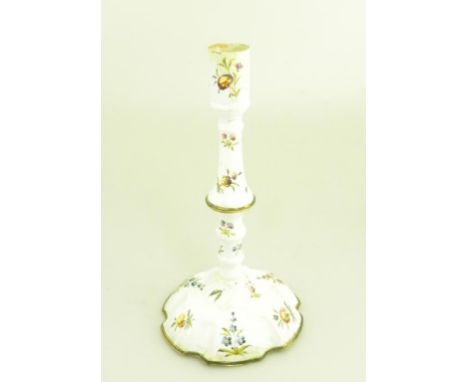 A GEORGE III SOUTH STAFFORDSHIRE ENAMEL CANDLESTICK, PAINTED WITH FLOWERS AND SPRAYS, C1770