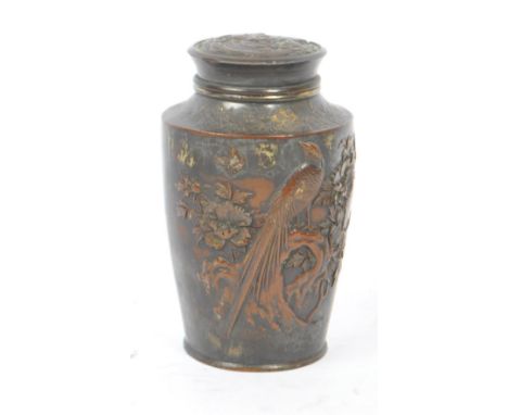 An early 20th century Meiji period Japanese bronze tea caddy. The tea caddy being of baluster form with relief decoration of 