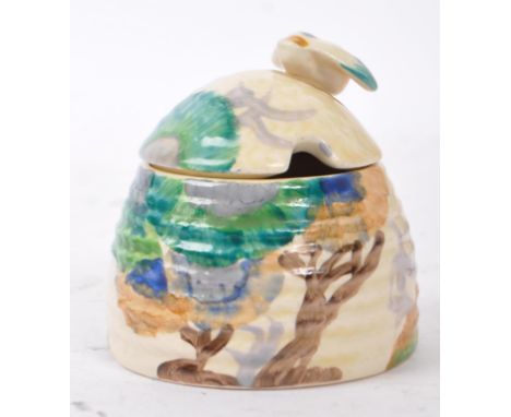 Clarice Cliff - 1930's /&nbsp;Mid 20th Century&nbsp;Art Deco Bizarre design honey pot. Having a domed cover with a small litt