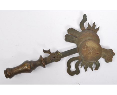 A 19th century bronze Chinese flag pole topper. The topper having twin sun motif to top terminating in a dragon head with hol