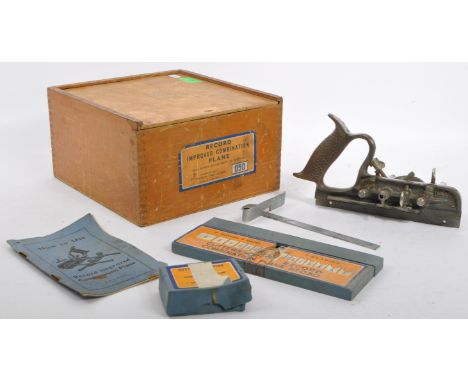A Record improved combination plane, model number 050 in its original wooden box with slide open lid (embossed ' RECORD TOOLS