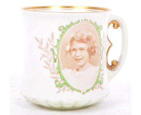 Of Royal Interest - A 1937 Princess Elizabeth Royal Doulton porcelain mug with E handle. Printed with a (commemorate, commemo