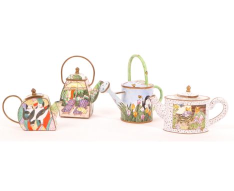 Four late 20th century miniature enamel & brass tea pots / watering can by Empress Arts. Lot to include three tea pot example
