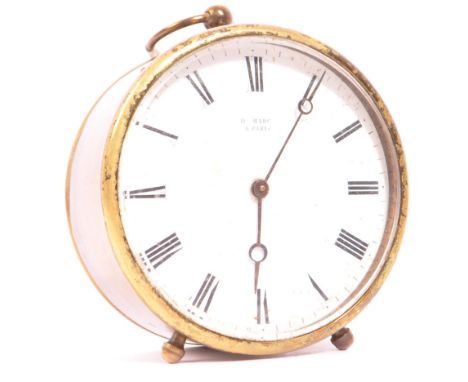 An early 20th century French brass cased carriage clock by Henry Marc, Paris.&nbsp;With white enamel dial&nbsp;with roman num