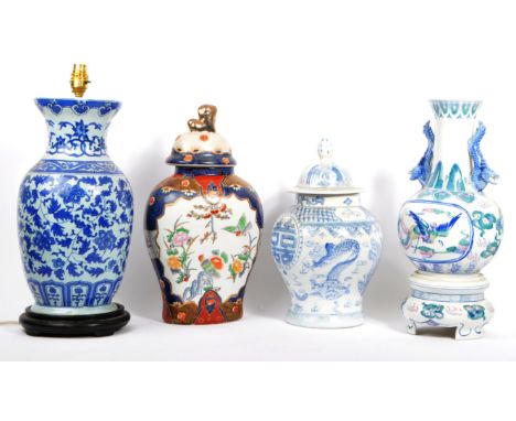 A collection of 19th century ceramic pottery lamp and vases. Blue and white lamp base with fixing. With a twin handled Chines