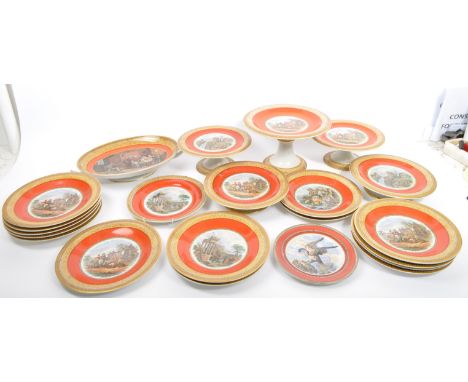 An extensive collection of 19th Century English prattware plates and tazzas all having orange and gilded decoration to includ