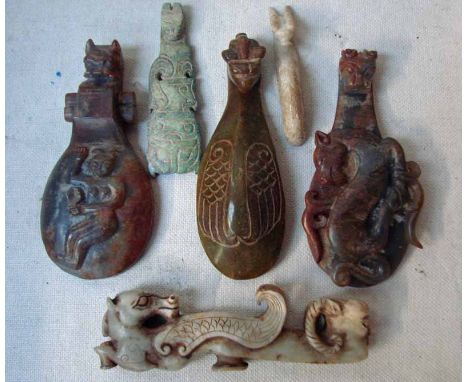 A collection of six carved Chinese jade/hardstone hooks as dragons, 10cm by 15cm long 