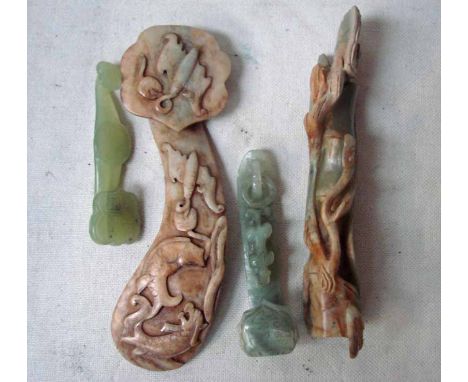 A collection of four carved Chinese jade/hardstone Ruyi, 13cm - 23cm long 