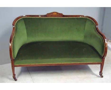 An Edwardian inlaid rosewood show frame two-seater sofa, the sides, back and seat upholstered in green velour, square taperin