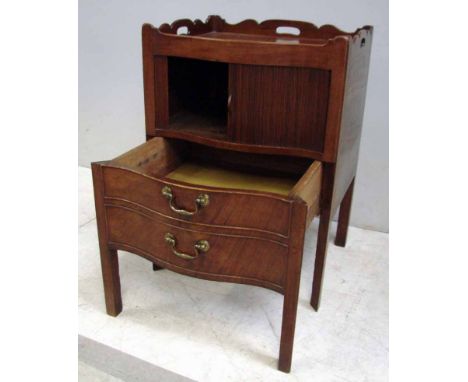 A George III mahogany tray top bedside commode, the gallery pierced with three hand grips, serpentine front housing a tambour
