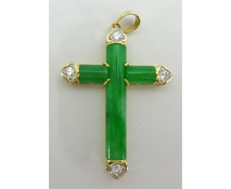 A modern jade and diamond cross set in 18ct yellow gold stamped .750, length 38mm, set with four diamonds, complete with Hong