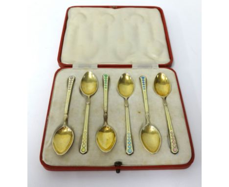 Set of six silver gilt and enamel tea spoons, 'T&S', in original fitted case.