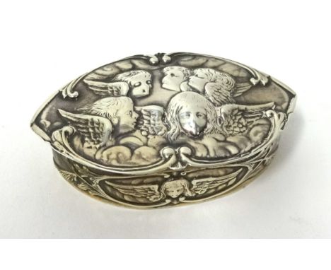 An Edwardian silver and gilt lined snuff box, Chester, with embossed cherub decoration.