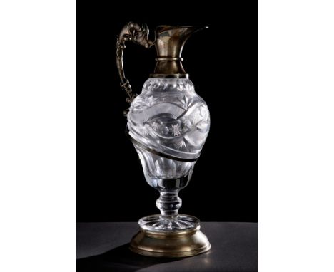 BACCARAT. France, ca. 1950.Pitcher with spout.Cut glass and silver.Provenance: Private collection, Spain between 1970-1990.Me