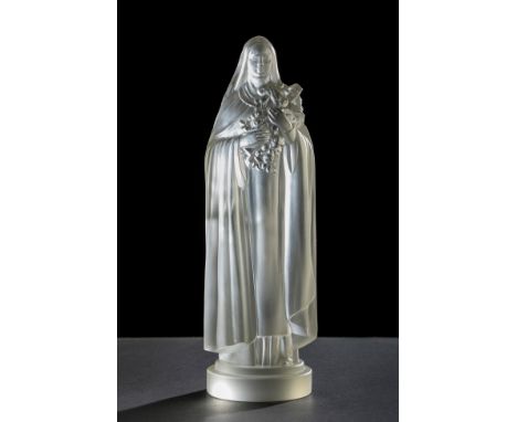 EDMOND ETLING (France, active 1820-1835)."Saint Therese of Lisieux".Moulded glass, ca. 1930.Signed on the base "Etling France