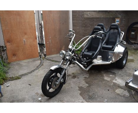 A 2002 Volkswagen 1600 trike, registration number Q197 PAE, frame number SABTVR03722133313, engine number AD063053, silver. T