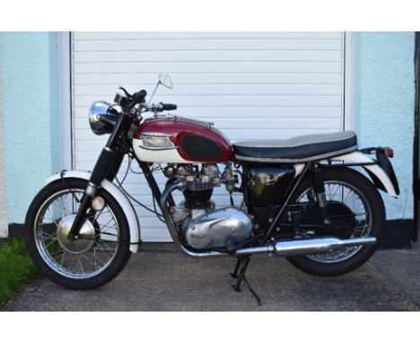 A 1965 Triumph TR6 SS Trophy, registration number FYL 54C, frame number TR6SSDU23654, engine number TR6SSDU23654, white/red. 