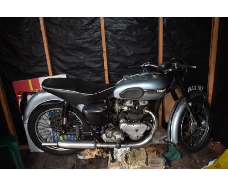 A 1955 Triumph Tiger T110, registration number NAX 787, frame number S63779, engine number T11063779, Shell blue. The Tiger T