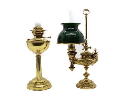A Victorian brass oil lamp, by Wild &amp; Wessel, Berlin, the reservoir modelled as a Persian-style lamp, with a clear glass 