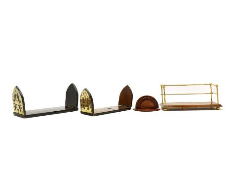 Two Victorian Gothic style book slides,comprising a coromandel and walnut example, with brass ends,the largest 36cm widetoget