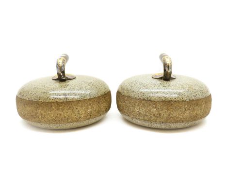 A pair of Scottish green granite curling stones,each with an inset plaque with an engraved cipher,27cm diameterCondition Repo