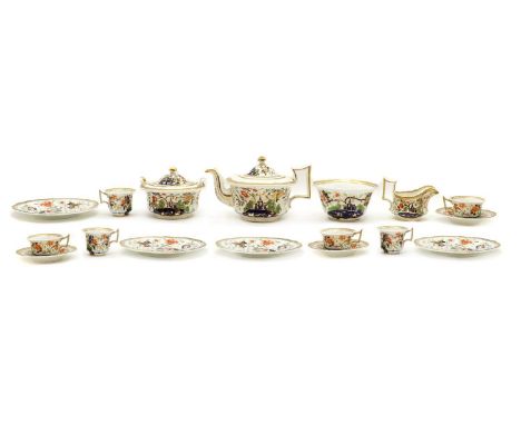 An Imari pattern Staffordshire porcelain tea service,c.1820, decorated in the style of Derby to a gilt border, painted with n