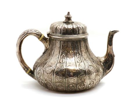 A Victorian silver teapot,by William Wrangham Williams, London 1867, with ivory insulators, 17cm high,18ozt[17:30] Grace Juli