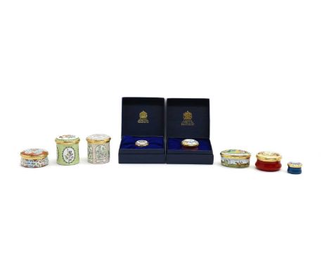 A collection of eight Halcyon Days enamel pill boxes,to include 'The Royal Enclosure at Ascot Races in Edwardian Times', 5.5c