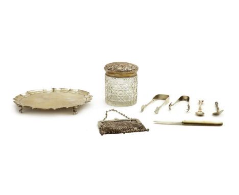 A collection of silver items,comprising a silver card tray, by James Dixon &amp; Sons Ltd., Sheffield 1925, with a Chippendal