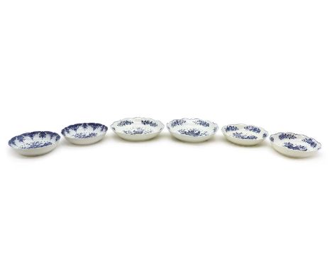 A group of Worcester porcelain cress dishes,18th century, each decorated in the Pine Cone pattern, comprising a pair of large