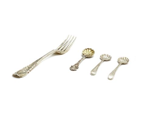A Victorian silver Rococo style serving fork,by Chawner &amp; Co, London 1840, decorated with foliate scrolls to an engraved 