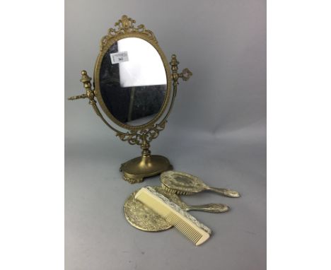 VINTAGE BRASS DRESSING GLASS, along with a three piece vanity set, a decorative mask, gilt framed portrait and two hand paint