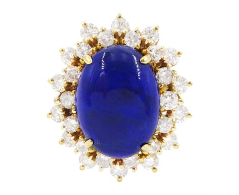 18ct gold lapis lazuli and diamond cluster ring, single oval cut lapis lazuli with two rows of round brilliant cut diamonds, 