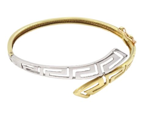 White and yellow gold key link design hinged bangle Condition Report:Approx 12.7gm, tested 13ct gold, inner circumference = 1