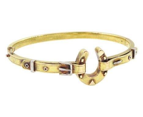 Early 20th century gold horseshoe and buckle hinged bangle, stamped 15ctCondition Report:Approx 9.22gm, inner circumference =