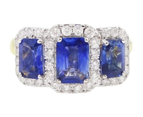 18ct gold sapphire and diamond cluster ring, three emerald cut sapphires, with round brilliant cut diamond surround, hallmark