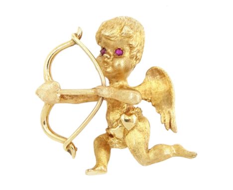 14ct gold cupid brooch, with ruby set eyes, stamped 14KCondition Report:Approx 7.85gm, body and back pin tested 14ct, length 