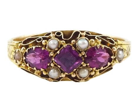 Victorian 15ct gold three stone vari-cut garnet and pearl ring, the shank with engraved fancy scroll decoration, Birmingham 1
