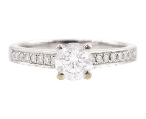 18ct white gold single stone round brilliant cut diamond ring, with diamond set shoulders, stamped 750, principal diamond 0.5